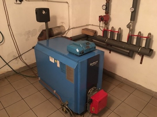 Existing inefficient old heating oil boiler Existing inefficient old heating oil boiler