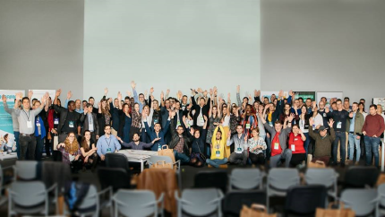 Participants of the Idea Challenge happily pose for a group shot 